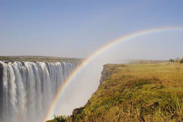 photo-of-rainbow-over-waterfall
