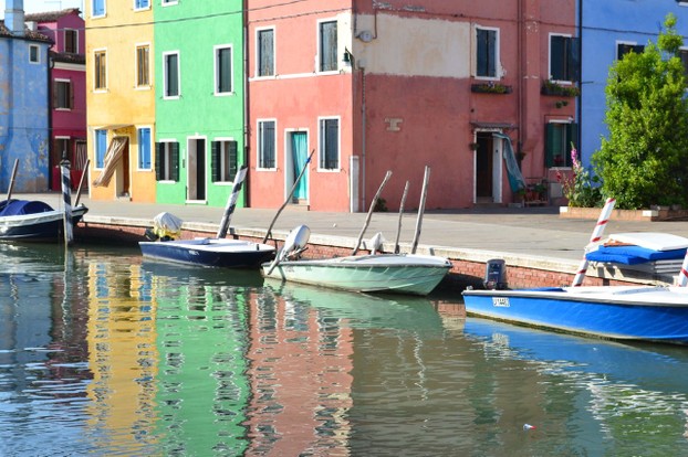 Reflections on a quiet Burano canal