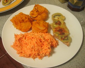 Kiwi chicken with potato puffs and carrot salad