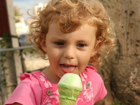 Sahratia ~ aged 3 eating an ice cream in the local park