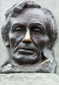 Shiny nose on Lincoln statue at Lincoln's tomb.