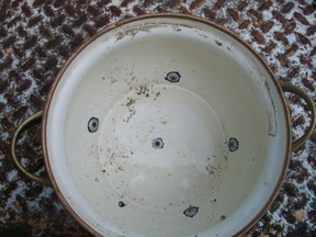 inside of pot with drilled holes