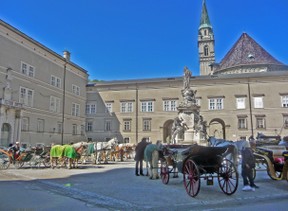 Carriages Await Passengers in Cathedral Square