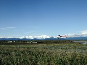 Plane landing near the lodge