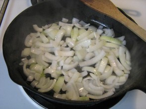 Onions broken up in the pan