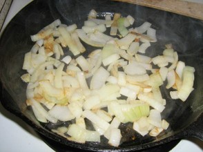 Onions lightly browning