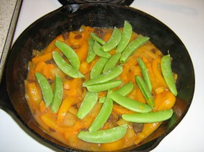 Peas added to the pan