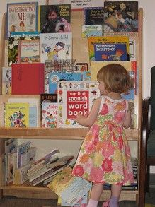 Child Looking at Books