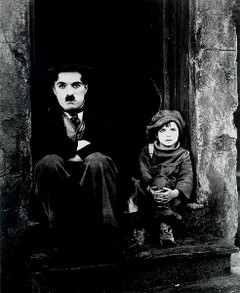 Charlie Chaplin and jackie Coogan in THE KID