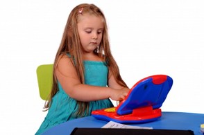 Little Girl Sitting on Bright Colorful Furniture