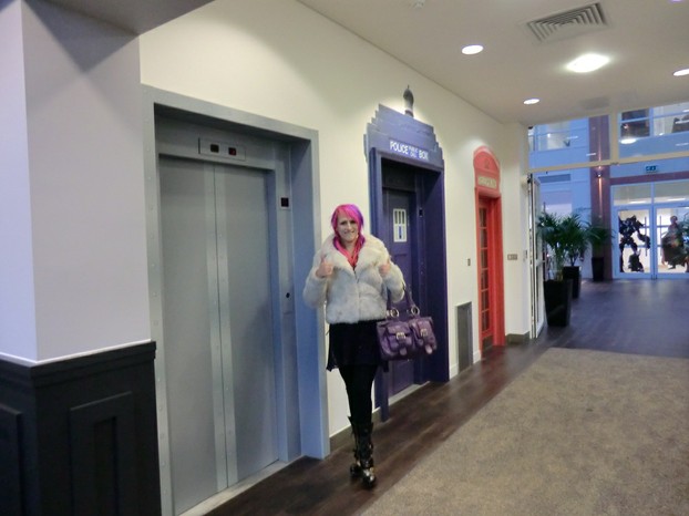 Image: Mod Poppy and a row of doors inside Jagex Studios.