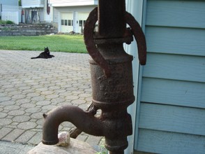 old water pump with horseshoe