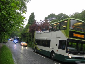 The Olympic Torch passing White Moss House, Grasmere, Cumbria, England