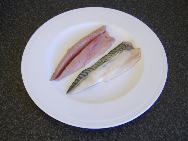 Two boneless mackerel fillets ready to be cooked to delicious perfection by your chosen method
