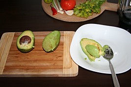 3. Scoop out the flesh of the avocados