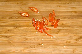 7. Finely chop half a chili pepper