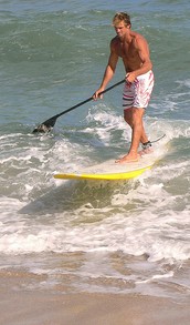 Laird Hamilton on Stand Up Paddle Board