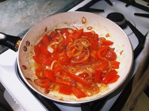 Fry the onion, pepper, and tomatoes, then add the stock.