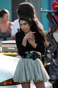 Amy Winehouse sporting her signature 'half up' beehive.