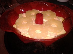 5. Cheese mix and pineapples placed on top half of the cake batter