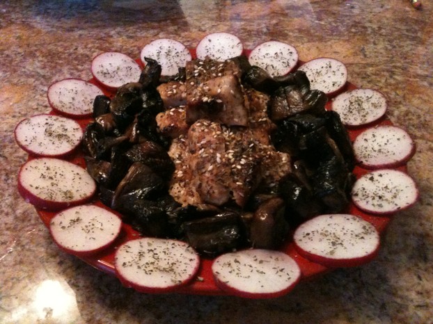 Teriyaki Turkey Breast Surrounded by Fried Portobello Mushrooms and Radish Slices