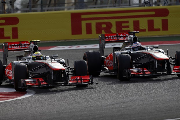McLaren drivers Sergio Perez and Jenson Button
