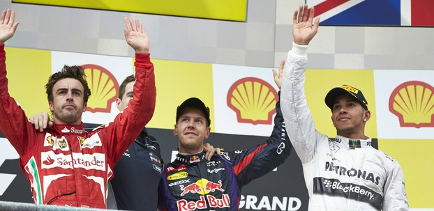 Fernando Alonso, Sebastian Vettel and Lewis Hamilton celebrate in Spa