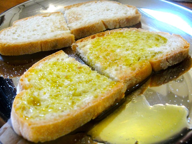 olive oil on Italian bread: the basis for bruschetta