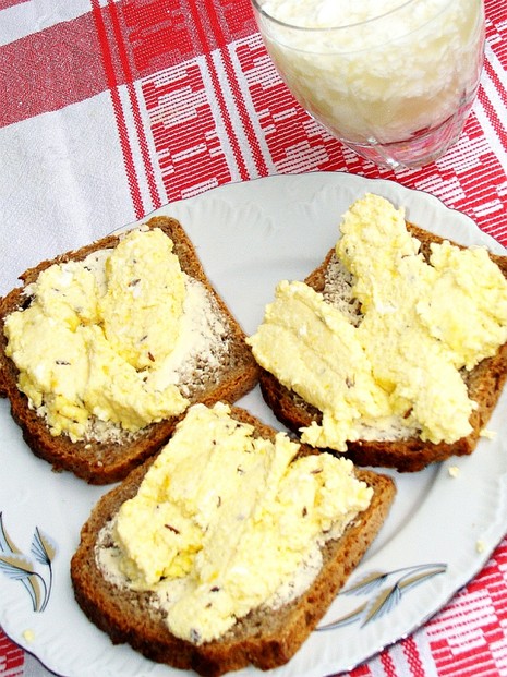 Bread spread with cooked cheese