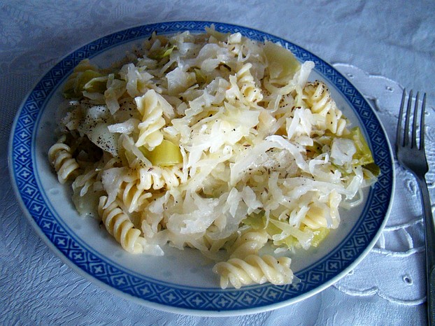 Fried cabbage and noodles with caraway seed