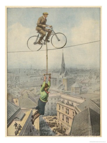 German Husband and Wife Team Perform a Dramatic Tightrope Cycling Act