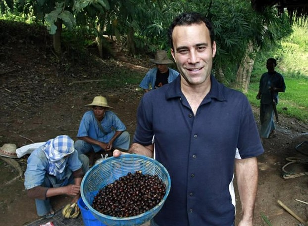 Black Ivory Coffee creator and owner Blake Dinkin with his company's coffee beans