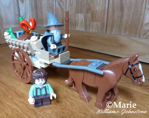 Gandalf with Frodo Baggins arriving on his Horse and Cart