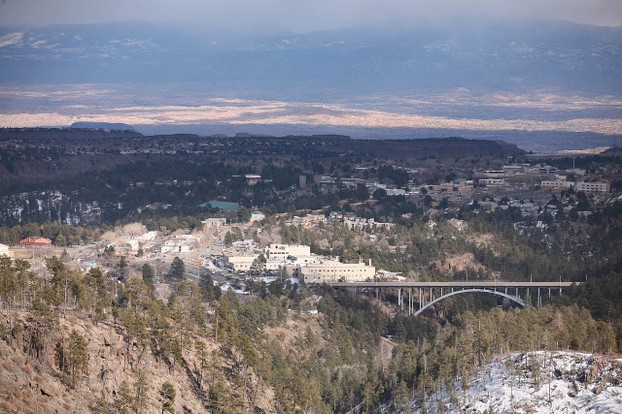 view of Los Alamos (Spanish: Los Álamos, "the cottonwoods"), with Omega Bridge across Los Alamos Canyon