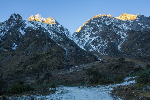 early morning view of Kanchenjunga, world's third largest peak, situated on Sikkim-Nepal border; northwest Sikkim, northeast India