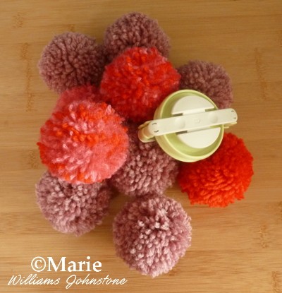 Make lots of fluffy pom poms with the Clover maker in no time at all!