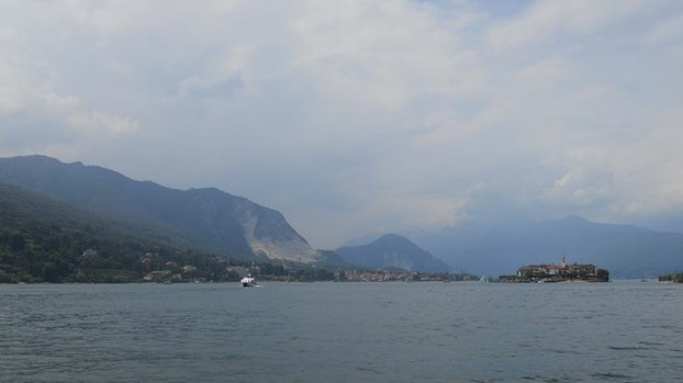 Isola Bella framed by the magnificent peaks of the distant Alps.