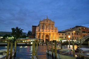 A vaporetto stop at night in Venice