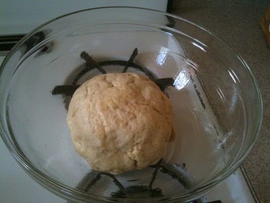 One ball of pizza dough, ready to rise for one hour.