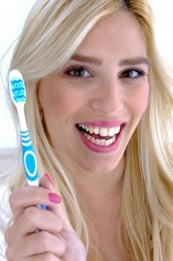 Lady with toothbrush