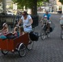 Another parent and kids on a bike