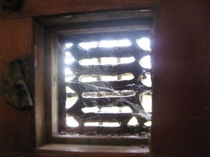 Grill at Carisbrooke Priory. Once a closed order, the door was not open to everyone