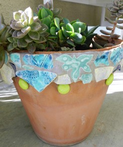 Dressed up flower pot by student