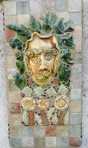 Mosaic of custom pottery pieces, tile and glass