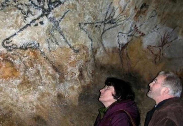 B. & G. Delluc in Lascaux cave
