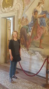 Posing by a fresco in the Villa Pisani