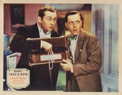 Eddie Ellison (James Dunn) and Larry Scott (Ray Walker) with pearl necklace they did not steal; lobby card