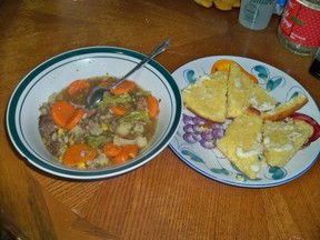 Soup in bowl, cornbread on plate ready to eat
