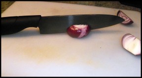 ceramic knife effortlessly cutting onion