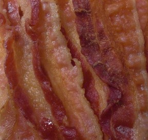 Fresh sizzling crispy bacon